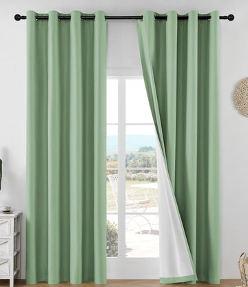 OUOIO 100% Blackout Curtains 2 Panels Set featuring thermal insulated long curtains